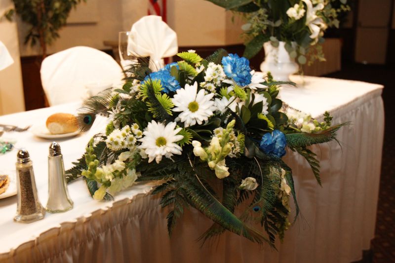 This is a beautiful sample head table centerpiece from Anton's Florist